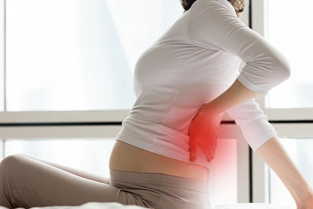 Rückenschmerzen im ersten Trimester: 5 Ursachen
